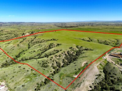 Exceptional Montana acreage for sale from an aerial view with lines drawn for property lines.